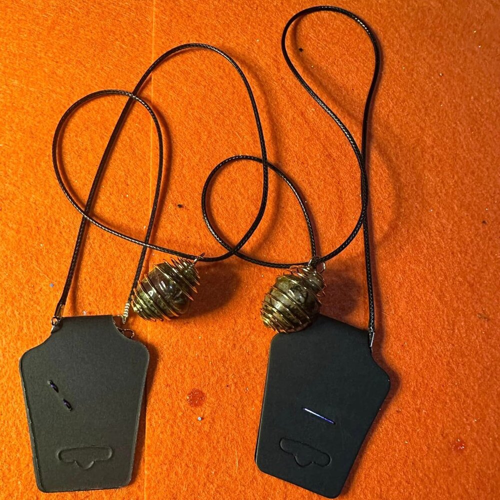 Caged acorn crystal necklaces